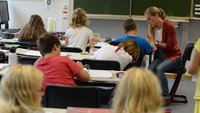 Schulklasse mit Lehrerin