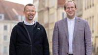 Christian Fechtenkötter (links) und Lars Schlarmann stehen auf dem Prinzipalmarkt in Münster.