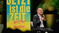 Olaf Scholz auf dem Podium beim Kirchentag in Nürnberg